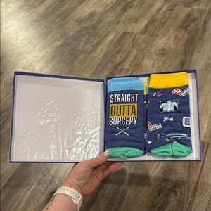 Never used or opened Straight Outta Surgery Socks - Blue and Yellow size 7-14 W